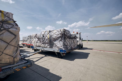 Cargo containers at airport. preparation before for loading to freight airplane.