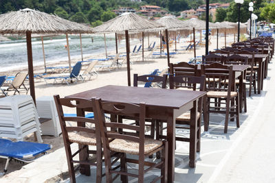 Empty chairs and tables at restaurant