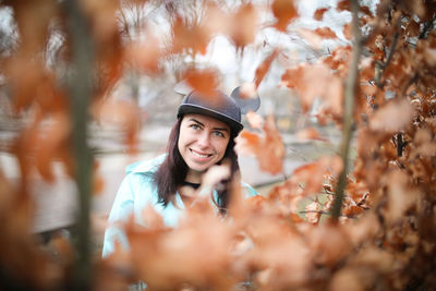 Portrait of a young woman in park