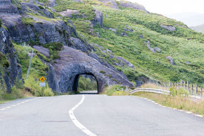 Road leading towards mountain