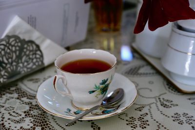 High angle view of coffee cup on table