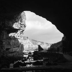 Scenic view of cliffs against sky