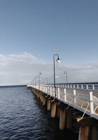 Pier on sea against sky