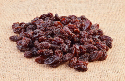 Close-up of dried fruits on burlap