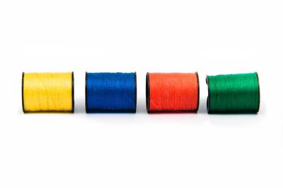 Close-up of colorful thread spools