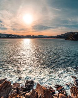 Scenic view of sea against sky during sunset