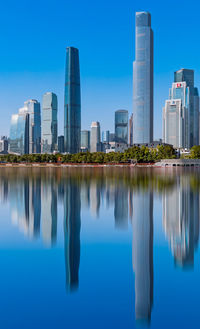 Reflection of buildings in swimming pool