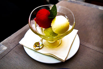 Fruits in plate on table