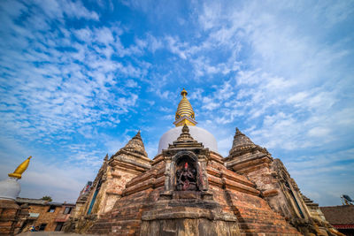 Low angle view of temple building against sky