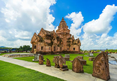 View of temple against cloudy sky