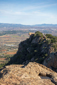 High angle view of rock formations against sky