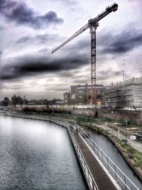 View of river against cloudy sky