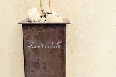 Close-up of text on wall