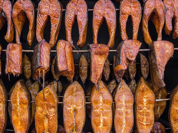 Close-up of roasted fish for sale in market