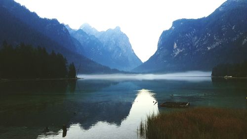 Reflection of trees in calm lake