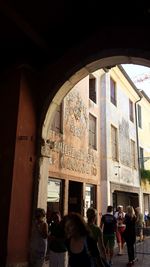 Tourists in front of building