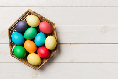 Directly above shot of eggs in carton on table