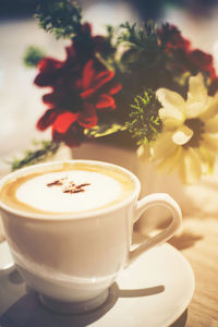 Close-up of coffee cup on table