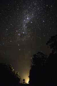 Low angle view of star field against sky at night