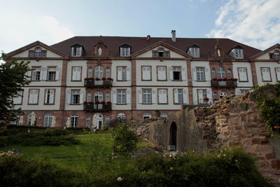 Low angle view of old building against sky