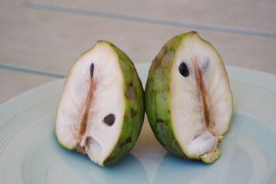 High angle view of fruit in plate on table