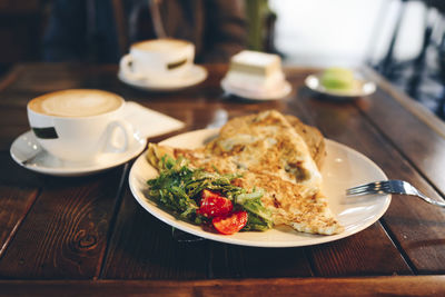 High angle view of breakfast served on table