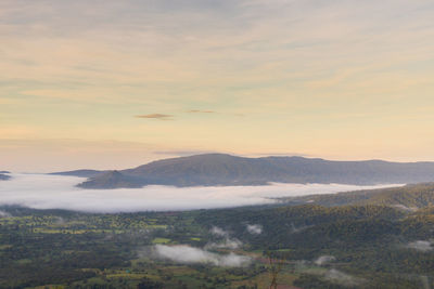 Scenic view of mountains against sky during sunset