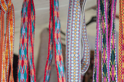 Close-up shot of laces hanging in store