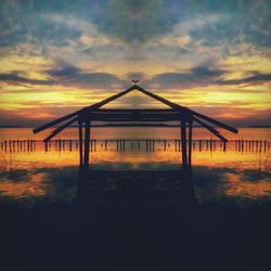 Scenic view of beach against sky during sunset