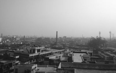 Cityscape against sky during winter