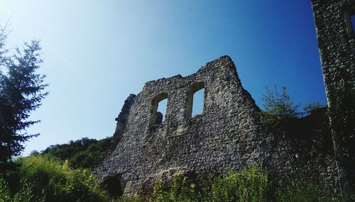 Low angle view of old building against sky