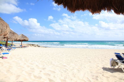 Scenic view of beach against sky