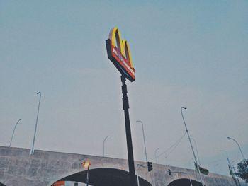 Low angle view of street light against clear sky