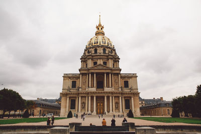 People outside les invalides quarter in city