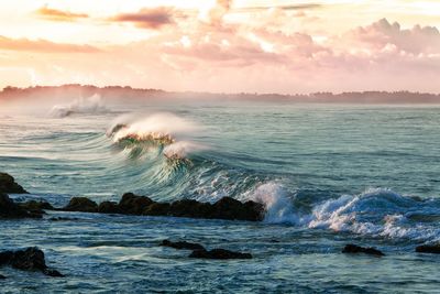 Scenic view of sea against sky during sunset