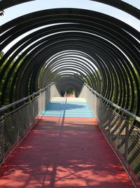 Empty footbridge in tunnel