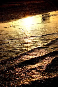 Scenic view of sunset over river