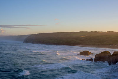 Scenic view of sea against sky during sunset