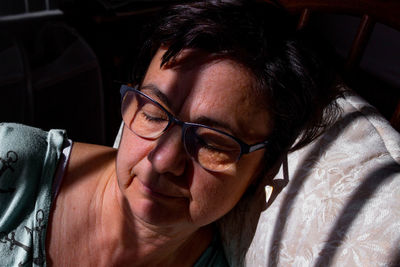 Close-up woman wearing eyeglasses
