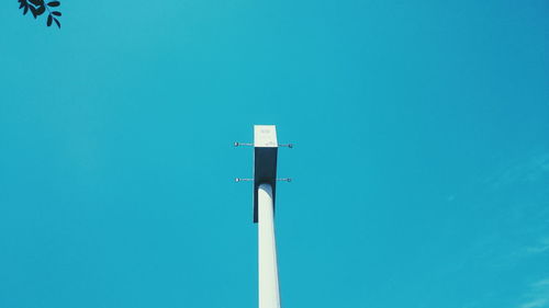 Low angle view of street light against clear blue sky