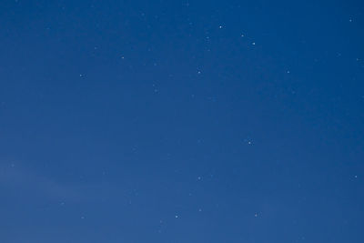 Low angle view of blue sky at night