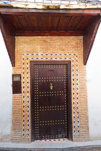 Low angle view of closed door of building