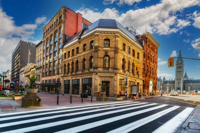 Downtown core of ottawa, parliament area, buildings in city against sky. 