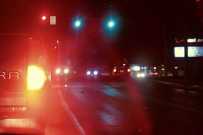 Traffic on road in city at night