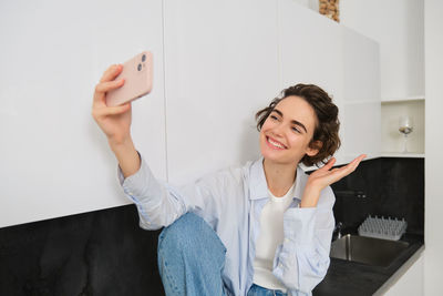 Young woman using mobile phone