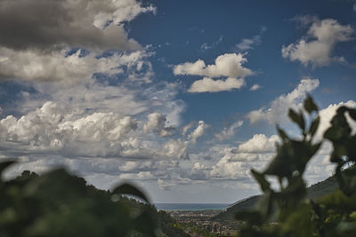 Aerial view of city against sky