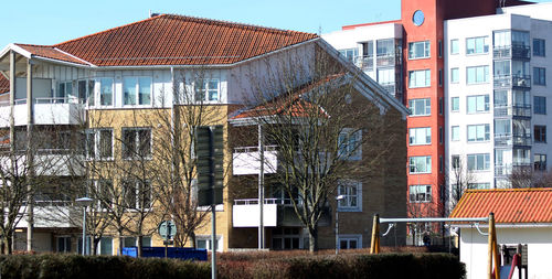 View of residential buildings against sky