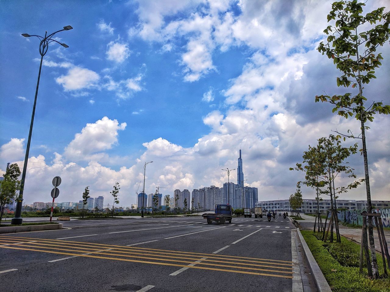 VIEW OF CITY STREET AGAINST SKY