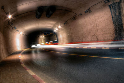Light trails on road in tunnel