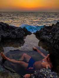 Scenic view of sea against sky during sunset